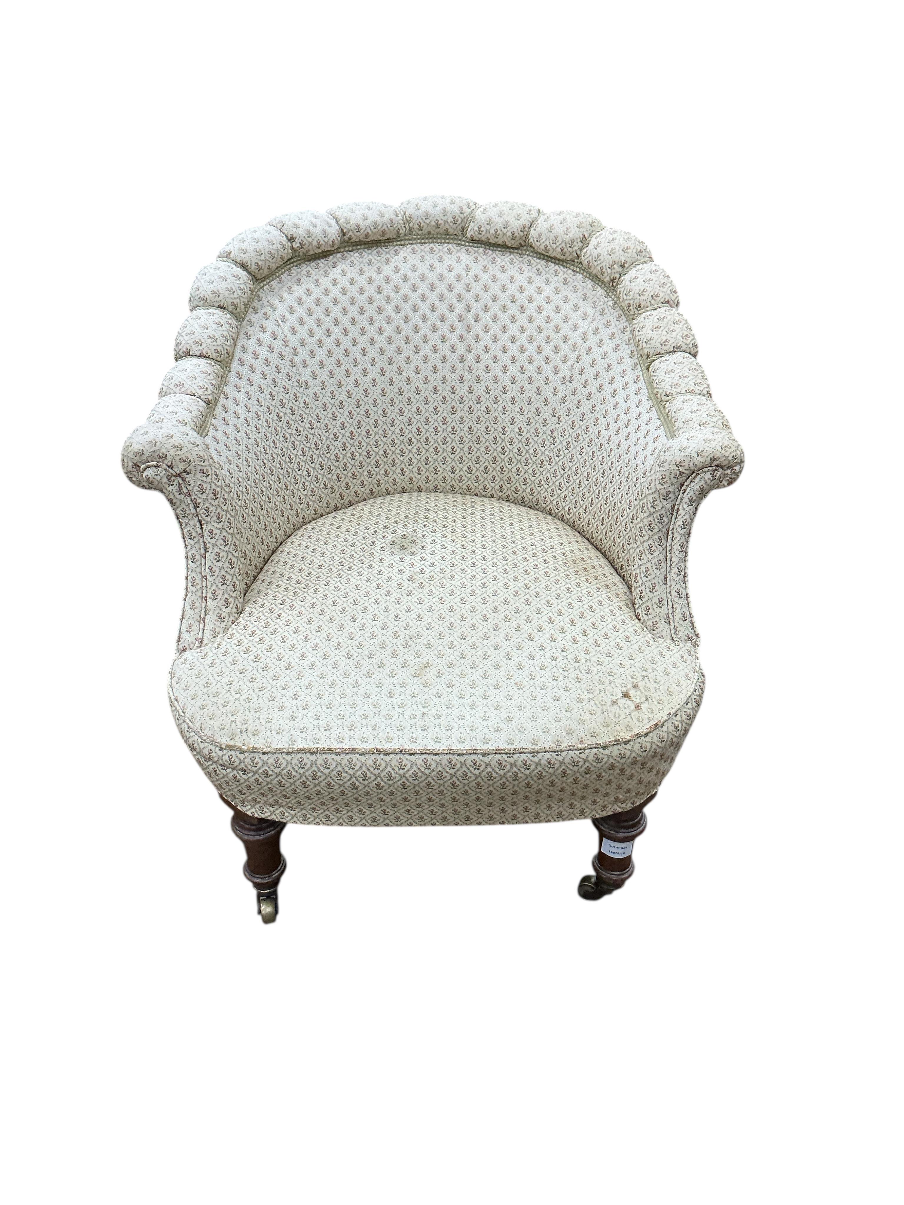 An early Victorian upholstered armchair, width 74cm, depth 76cm, height 74cm